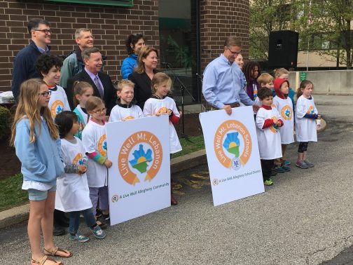 ACHD Director Dr. Karen Hacker joins Mt. Lebanon Commissioners, School Board members and residents to announce that community's involvement with the Live Well Allegheny initiative.