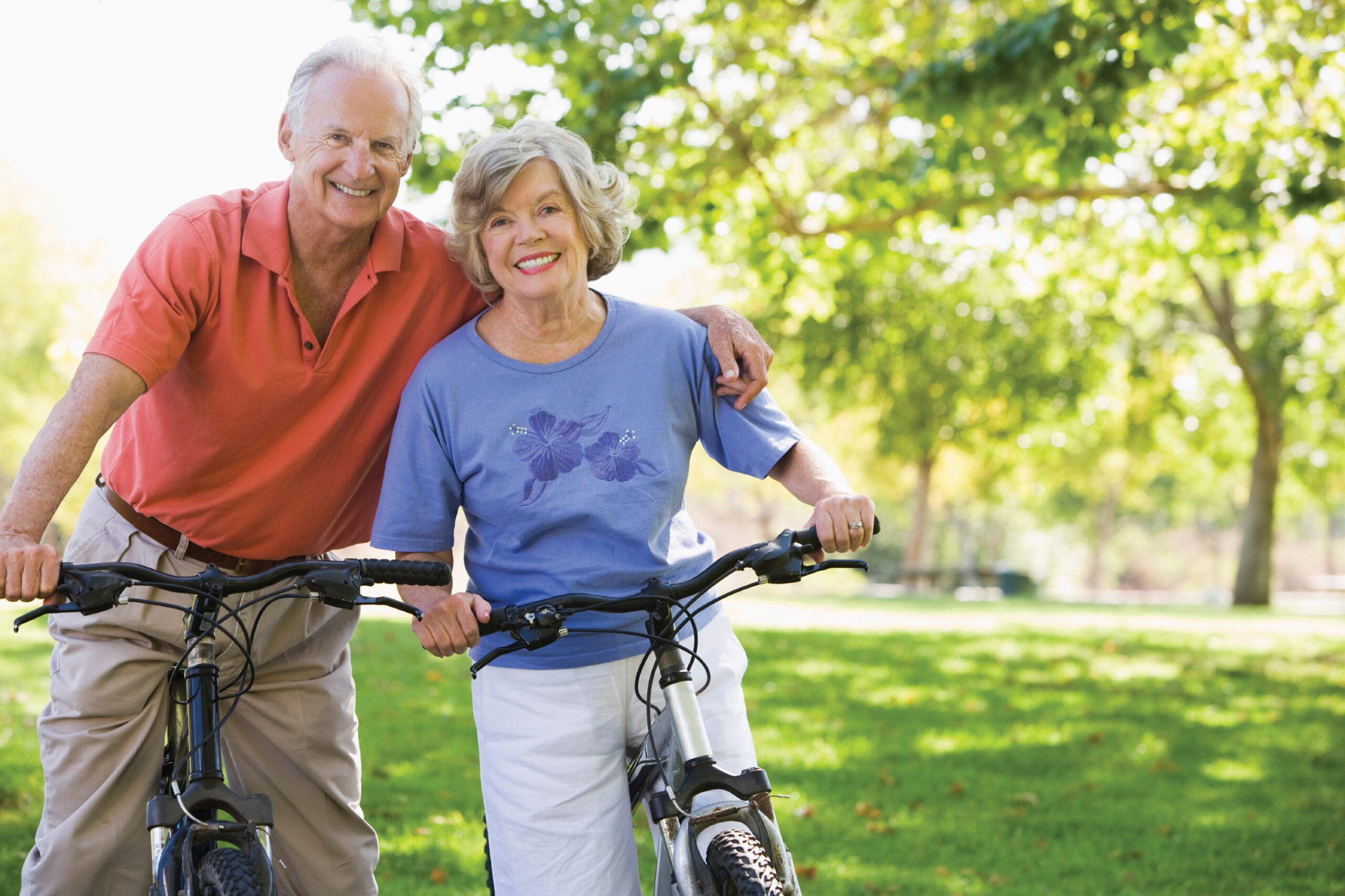Senior couple on cycle ride in countryside